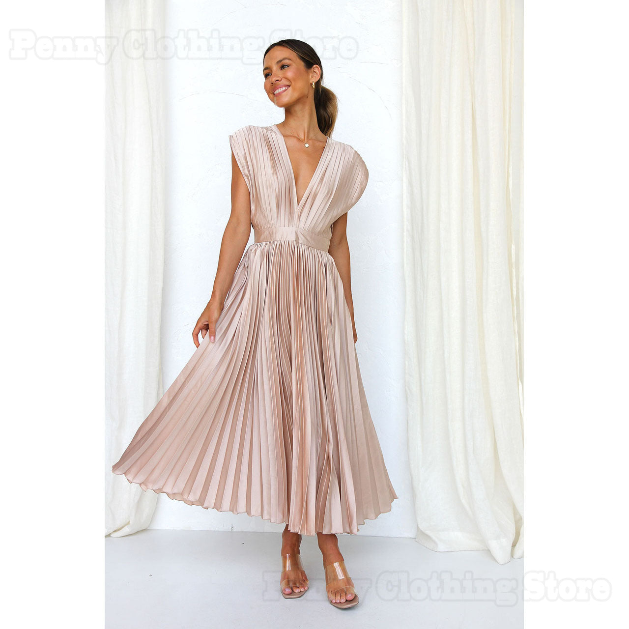 Marianne™ – La robe plissée pour une élégance intemporelle