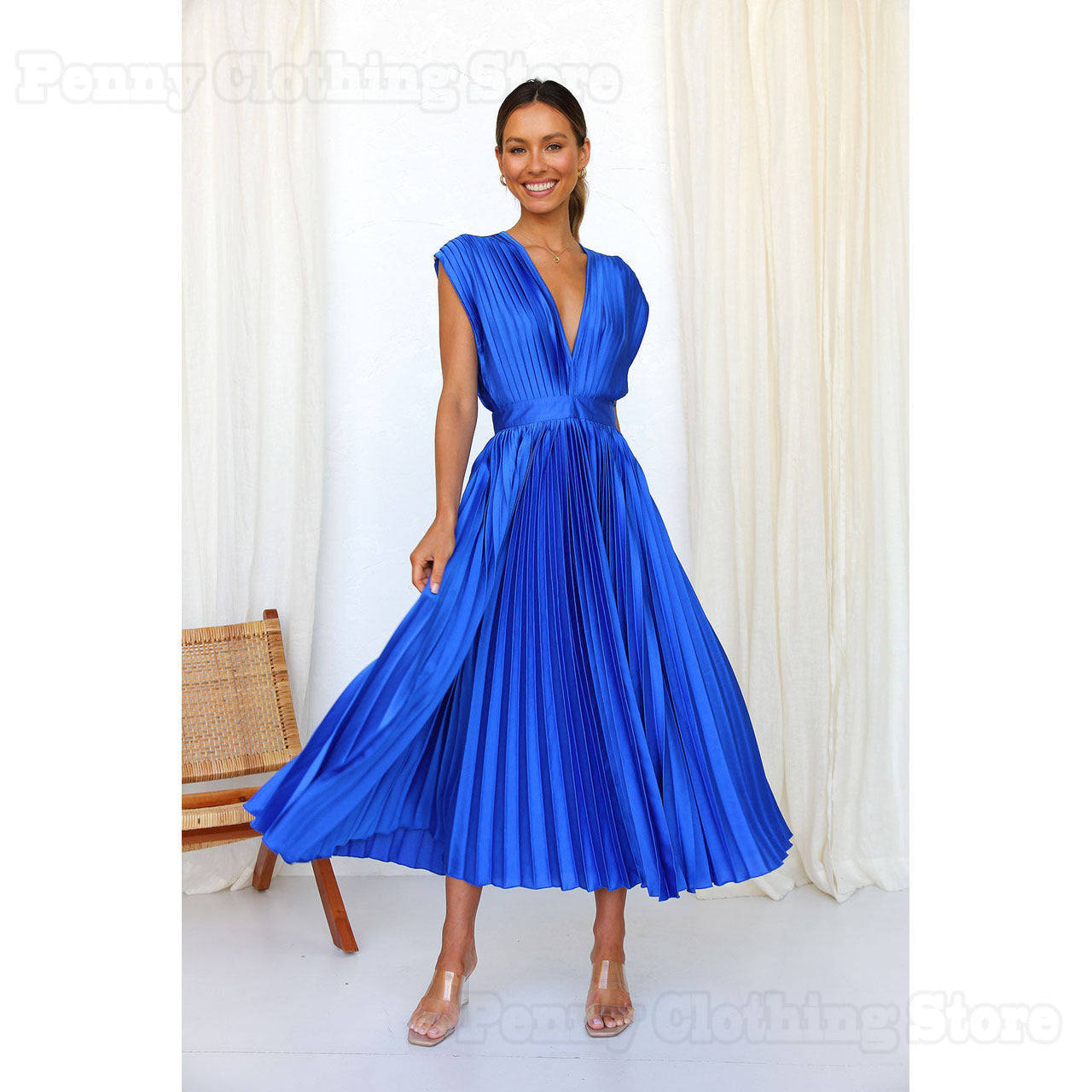 Marianne™ – La robe plissée pour une élégance intemporelle