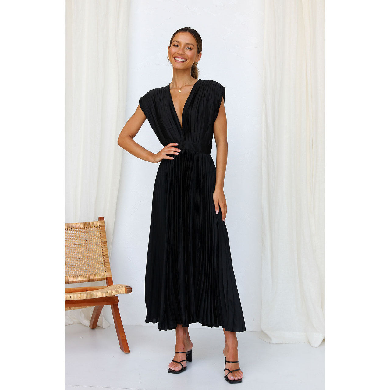 Marianne™ – La robe plissée pour une élégance intemporelle